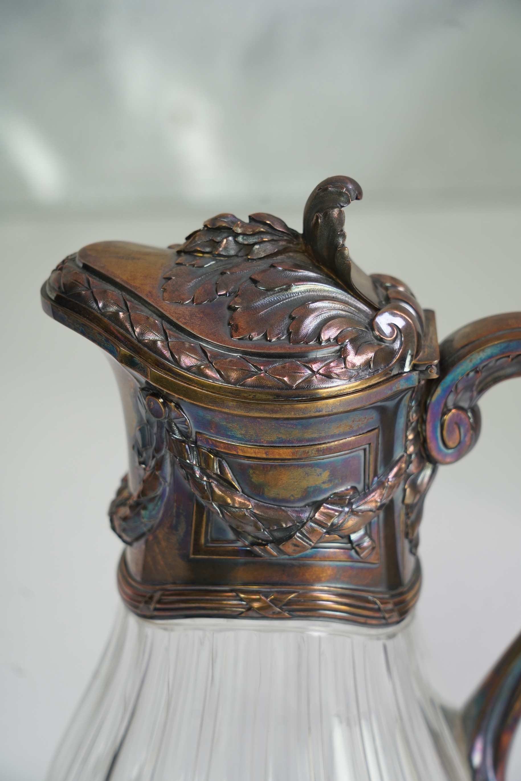 An early 20th century French 950 standard white metal mounted glass claret jug, by Risler & Carre